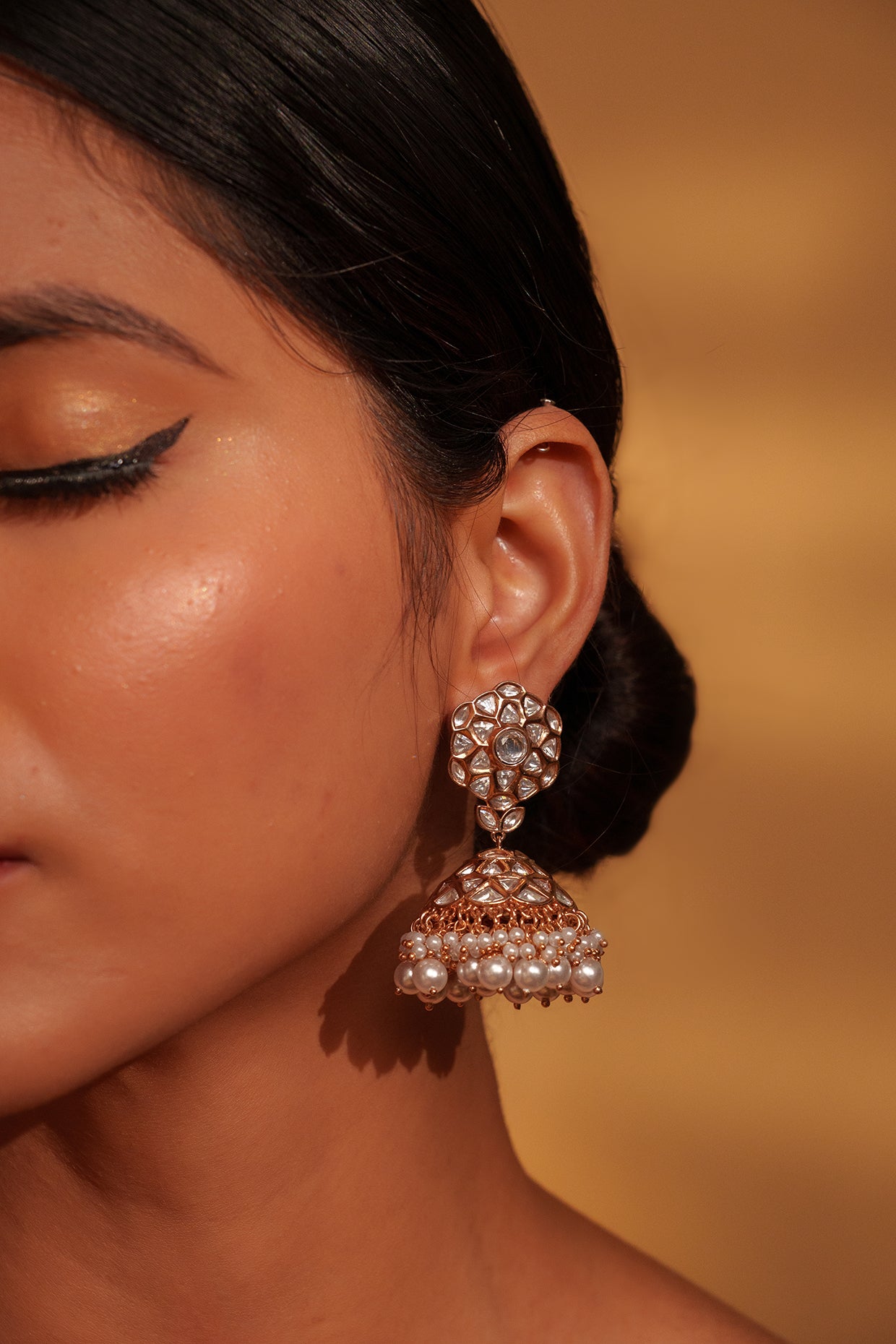 Classic Gold Jhumka Earrings with White Kundan and Pearls